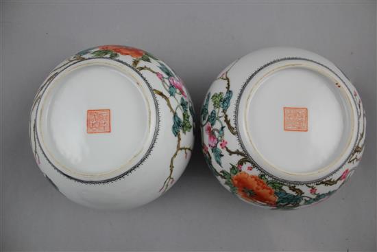 A pair of Chinese famille rose globular bowls, Qianlong marks, Republic period, 16.5cm diam, stands